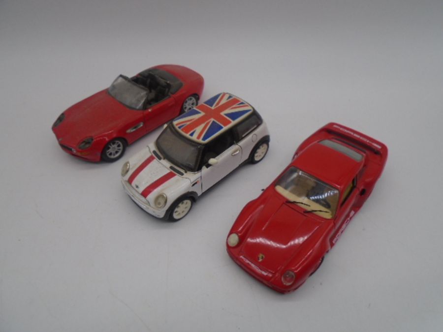 A collection of die-cast cars including 19 Corgi Olympic 2012 boxing London Black Taxi's, Maisto - Image 3 of 8