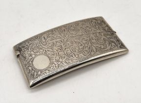 A hallmarked silver curved card case, Birmingham 1921