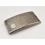 A hallmarked silver curved card case, Birmingham 1921