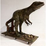 A large hand-made freestanding sculpture of a dinosaur. This dinosaur (based on a Raptor) stands 1.9