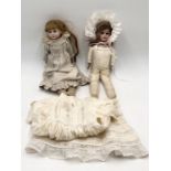 Two antique bisque headed dolls - one marked for Armand Marseille and the other with indistinct