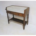 An Edwardian mahogany washstand with marble top and two drawers, length 94cm, height 82cm.