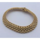 A 9ct gold bracelet, weight 9.3g