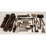 A collection of antique and vintage tools including a pair of Astor shears, planes, chisels etc
