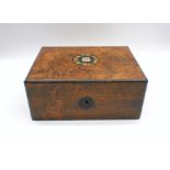 A Victorian inlaid sewing box with decorative mother-of-pearl inlay to top.