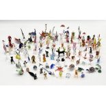 A large collection of various glass animals