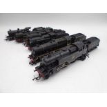 A collection of six unboxed OO gauge model railway black steam locomotives with tenders including