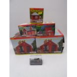 A collection of five boxed Hornby Skaledale OO gauge scale model buildings including two Double Road