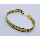 A 9ct gold bracelet, weight 9.4g