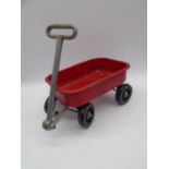 A child's pull-along trailer - length 30cm