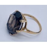 A 9ct gold smoky quartz ring