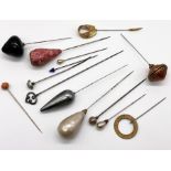 A collection of vintage hatpins including silver Charles Horner and coral example