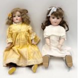 Two antique Armand Marseille bisque headed dolls numbered 370 and 390