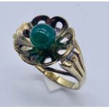An 8ct gold (marked 333) ring set with jade