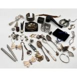 A collection of costume jewellery, silver spoons, pipe etc