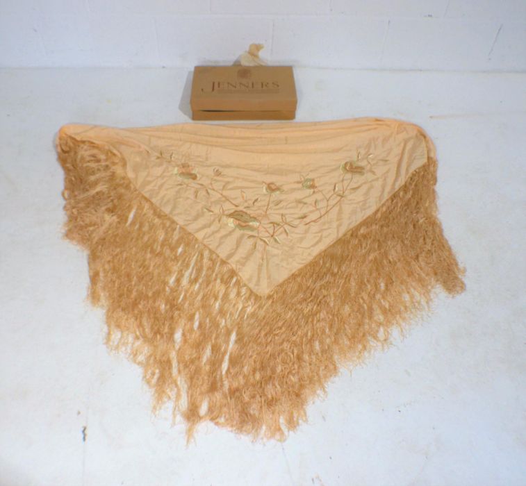 A vintage embroidered silk shawl.