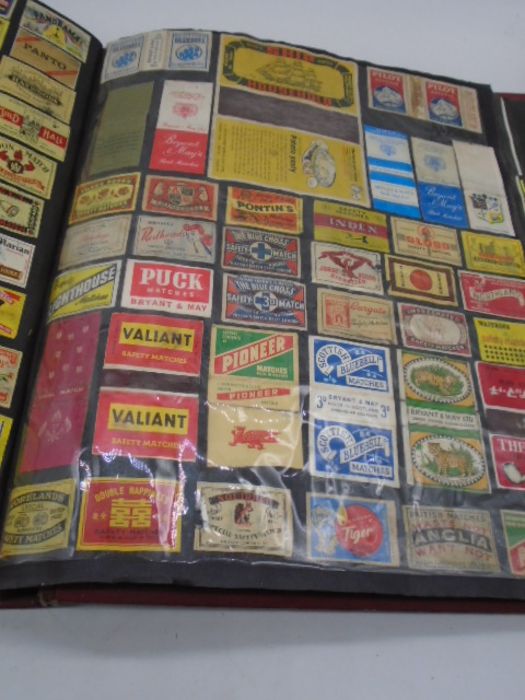 A large collection of vintage matchbox covers, an album and a box of loose. - Image 32 of 46