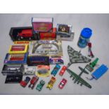 A collection of various die-cast model vehicles including Matchbox Models of Yesteryear, Moonbo Mini