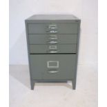 A 'Bisley' four drawer metal filing cabinet.