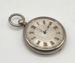 A "Fine Silver" fob watch with silvered dial