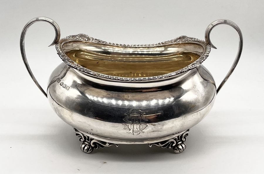 A hallmarked silver three piece tea set, Sheffield 1914, total weight 1129g (36.3 troy ounces) - Image 5 of 5