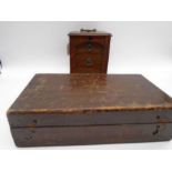 A small oak glass fronted cabinet with 3 drawers along with a vintage box