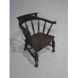 An elm captain's chair