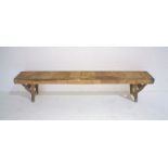 A rustic wooden folding bench, length 182cm, height 38cm.