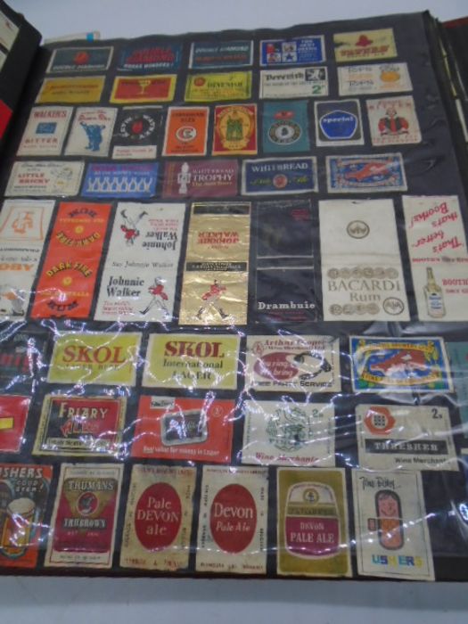 A large collection of vintage matchbox covers, an album and a box of loose. - Image 8 of 46