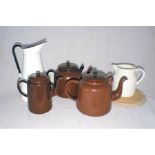 A quantity of enamelware, including jugs, pots etc.