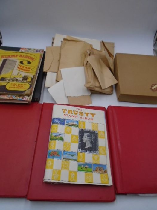 A large collection of loose and part completed stamp albums plus some first day covers.