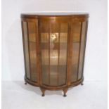 An Art Deco bow-fronted display cabinet, length 100cm depth 39cm, height 122cm.