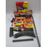 A collection of Hornby OO gauge accessories including six boxed rolling stock wagons/vans, boxed