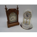 An anniversary clock on porcelain base along with a and mantle clock with silvered dial