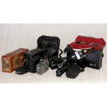 A collection of vintage cameras including The MiniCine, Synchronex Super Eight etc.