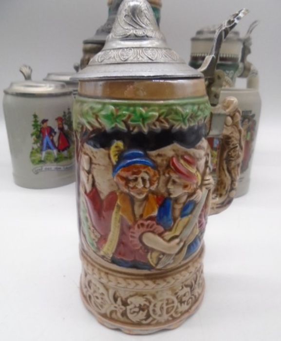A collection of twelve Steins. - Image 10 of 21