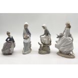 Four Lladro figurines including Cinderella, Evita, Girl with Lillies and Rabbit's Food