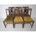 A set of six chapel chairs with upholstered seats, two stamped for J Elliott & Sons and dated 1957