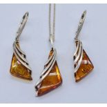 A 925 silver amber set of pendant on chain with matching earrings
