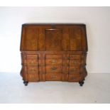 An antique "Dutch Colonial" block-fronted bureau, with fitted interior, locks signed Hobbs & Co.