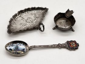 A small hallmarked silver fan shaped dish along with an ashtray with 1861 1000 Reis coin imbedded