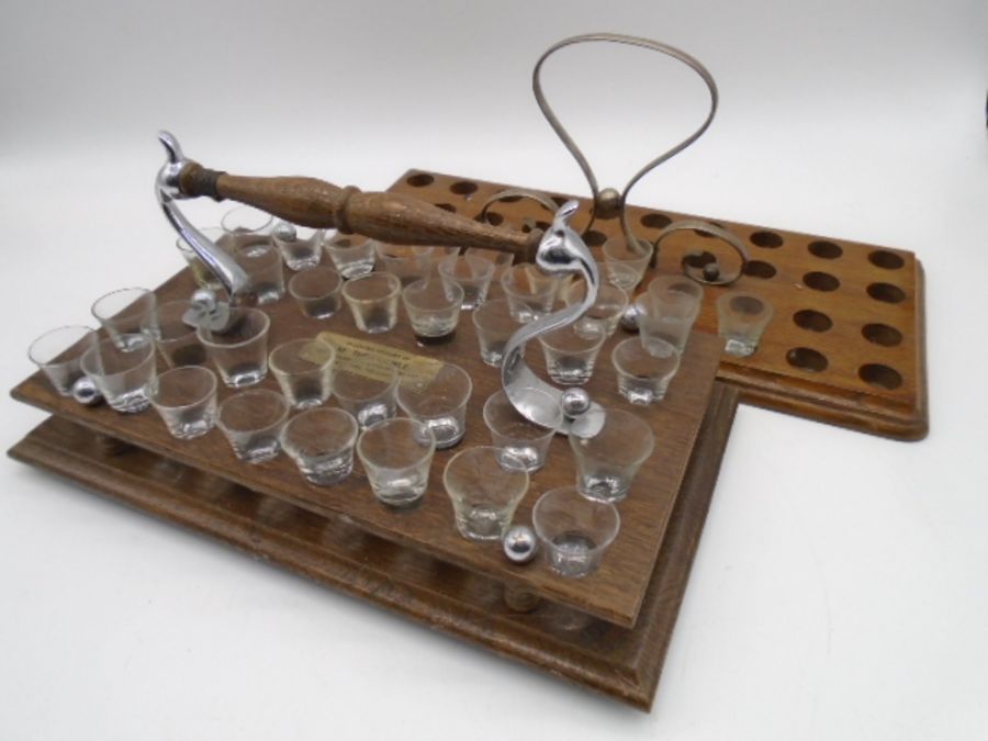 A complete vintage oak Ecclesiastical communion glasses set along with one other (incomplete)