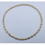 An 18ct white and yellow gold necklace, by Pascal at Harvey Nichols. Weight 50.9g