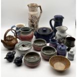 A collection of studio pottery including St Agnes, Merriott pottery, large sgraffito vase etc.