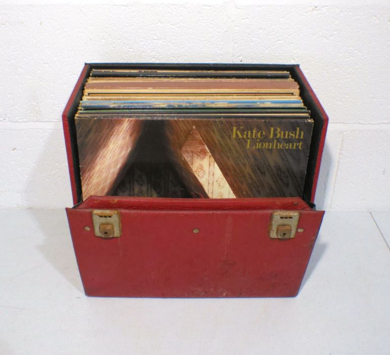 A quantity of 12" vinyl records, including Kate Bush, Lindisfarne, Steeleye Span, Dire Straits,