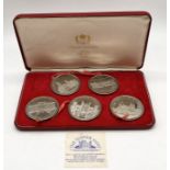 A cased set of five nickel plated 1977 Silver Jubilee coins by Tower Mint, in presentation box