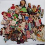 A collection of worldwide vintage dolls.