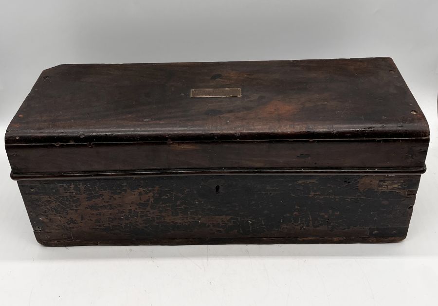 An antique metal bound small trunk, labelled with The Acetylene Illuminating Co Ltd (South