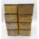 A collection of eight matching vintage tins.