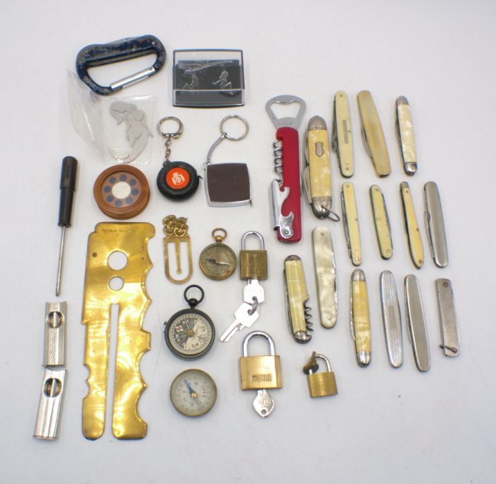 A mixed lot including penknives, compasses etc.